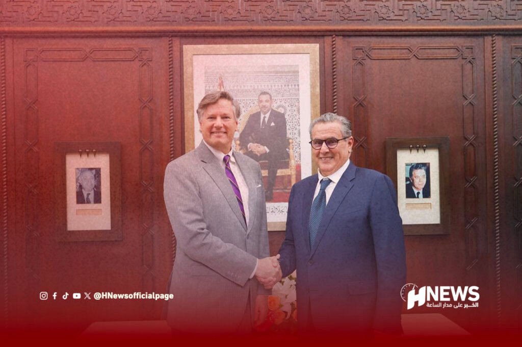 أخنوش ومسؤول حكومي