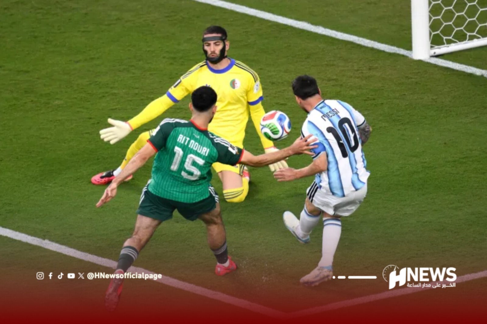 Soccer scene: a yellow-jerseyed goalkeeper blocks the ball near the goal as a green and a blue‑white opponent contest it nearby.