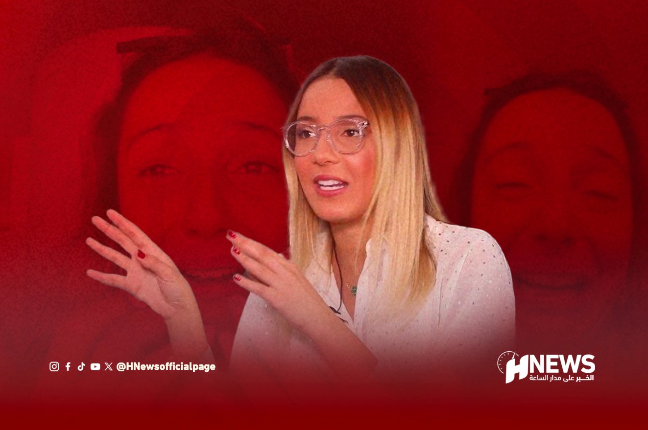 Presenter speaks during a segment on HNews, wearing clear-framed glasses and a white blouse, with a red-tinted background and the HNews logo visible bottom right.