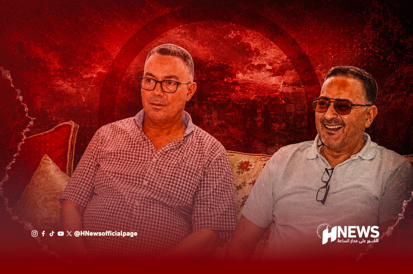 Two men sit on a sofa against a red textured background, with HNews branding in the bottom right.